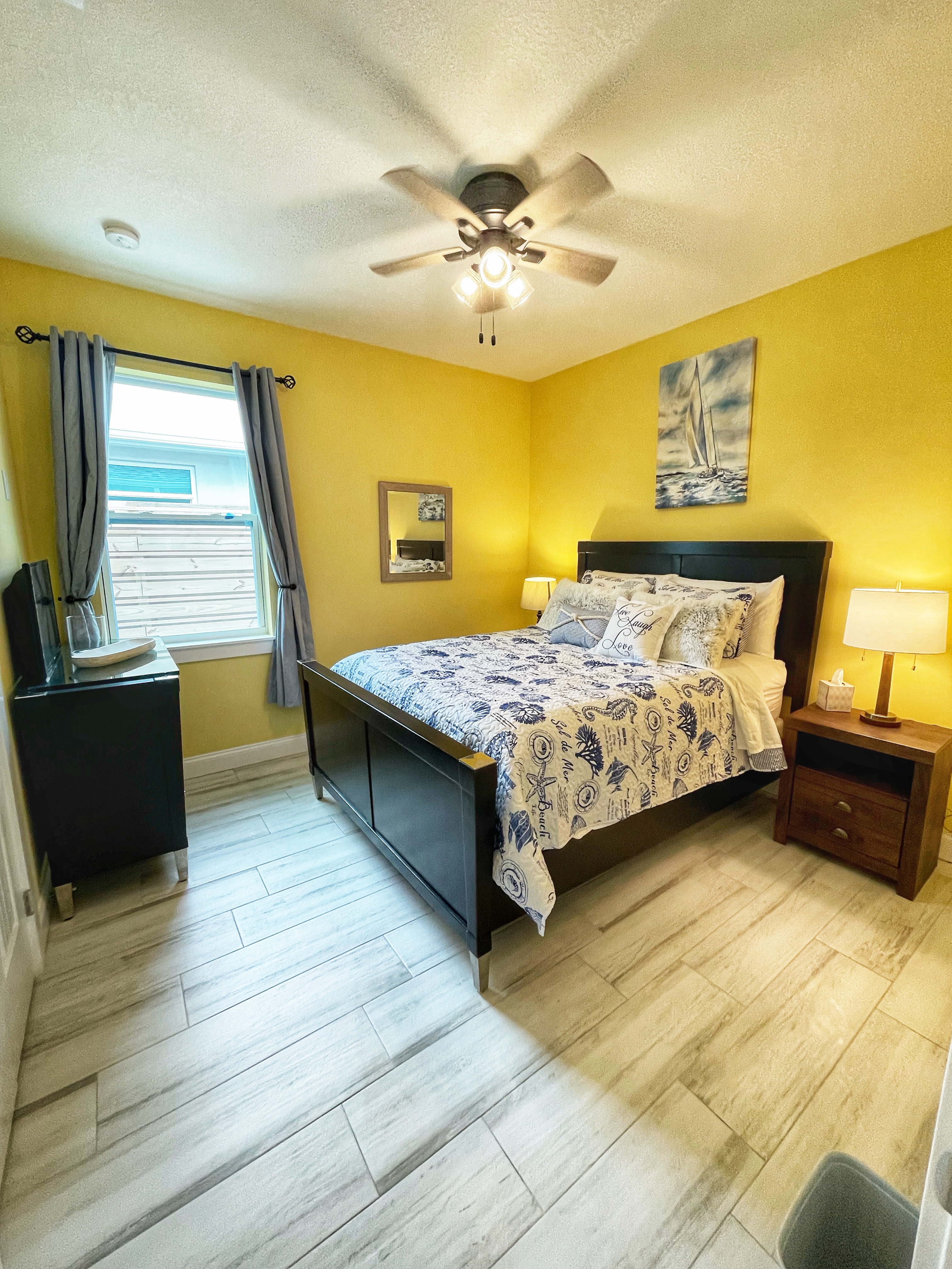Yellow-wall queen bedroom alternate view